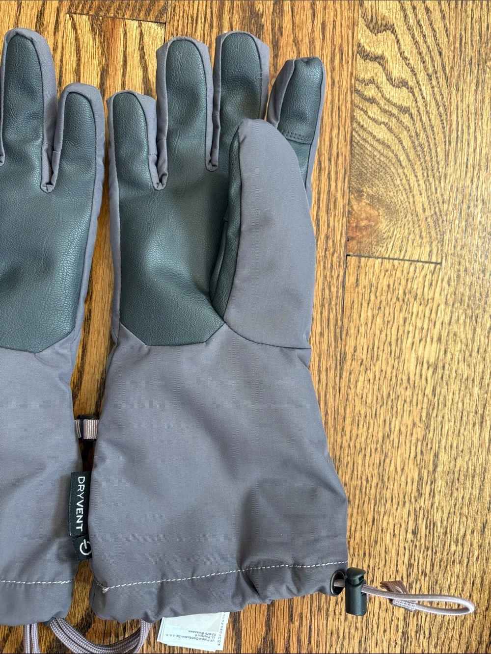 The North Face purple-grey women’s adjustable ski gloves. Excellent condition